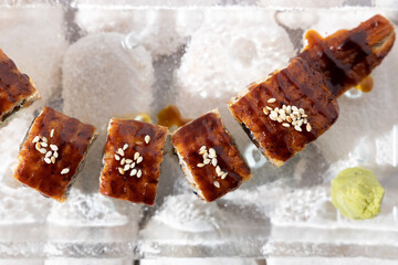 rolls with eel avocado in sauce