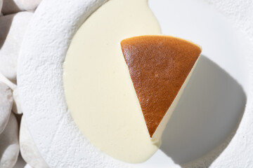 cream cake in a white plate