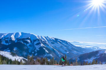 Skier on a Sunny Ski Slope