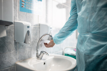 doctor washing their hands before surgery