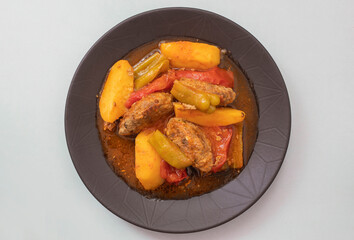 Traditional Homemade Turkish Food Kofte - Kofta with Tomato Sauce and Potatoes. (Turkish name; Izmir kofte)