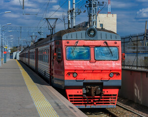 Electric train with traction electric locomotive ET2EM at the platform of the Finlandsky railway station