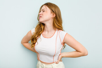 Young caucasian woman isolated on blue background suffering a back pain.