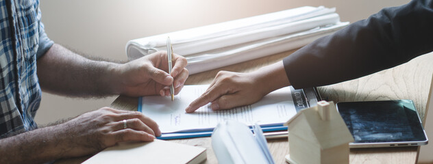 Business partners contract agreement success. Top view of close up hand of bank broker showing to...