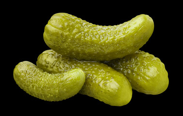 Delicious marinated pickled cucumbers, isolated on black background