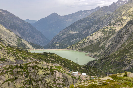 View of R&auml;terichsboden Lake at Grimsel Pass in Switzerland. It connects the Hasli valley in the Bernese Oberland with Goms in Valais Lake at Grimsel Pass in Switzerland.