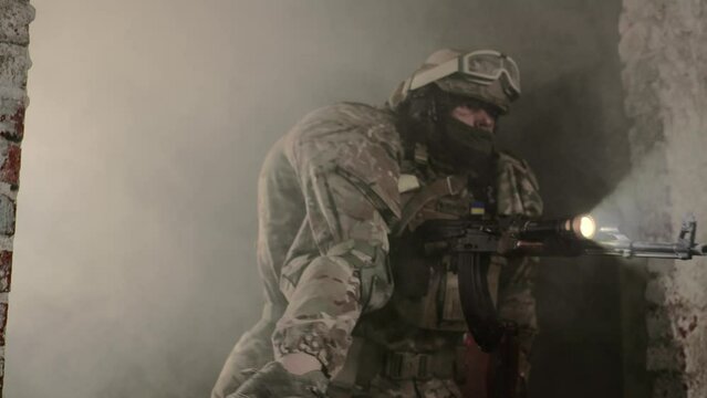 Evacuation of a wounded soldier. A soldier carries his wounded brother in arms from the battlefield.