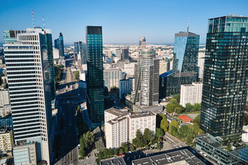 Aerial drone view of Warsaw cityscape, Center of Warsaw city with skyscrapers, Capital of Poland with modern office buildings in business center - obrazy, fototapety, plakaty