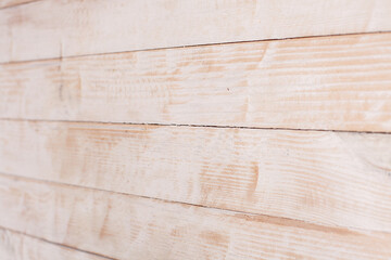 
Vintage white wood background texture with knots and nail holes. Old painted wood wall. White abstract background. Vintage white wooden dark horizontal boards. Front view with copy space. 
