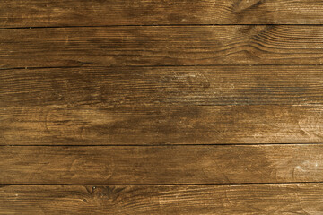 Vintage brown wood background texture with knots and nail holes. Old painted wood wall. Brown abstract background. Vintage wooden dark horizontal boards. Front view with copy space. Background for des
