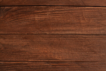 Vintage brown wood background texture with knots and nail holes. Old painted wood wall. Brown abstract background. Vintage wooden dark horizontal boards. Front view with copy space. Background for des