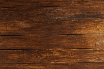 Naklejka premium Vintage brown wood background texture with knots and nail holes. Old painted wood wall. Brown abstract background. Vintage wooden dark horizontal boards. Front view with copy space. Background for des