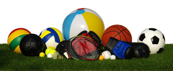 Sports equipment on grass isolated