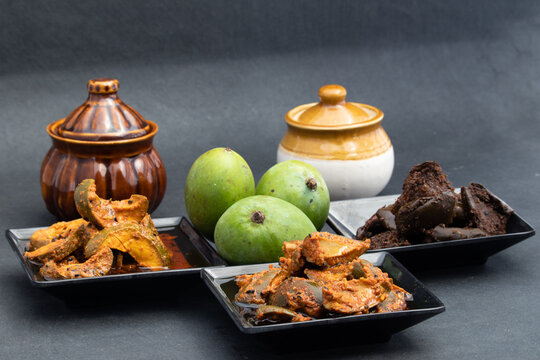 Mango Pickle Also Called Aam Ka Achar, Organic Dry Kachi Keri Achaar, Masaledar Sookha Kairi Made Of Kacha Raw Green Sliced Mangoes Mixed Marinated With Ghani Sarson Tel, Masala, Spices, Mustard Oil