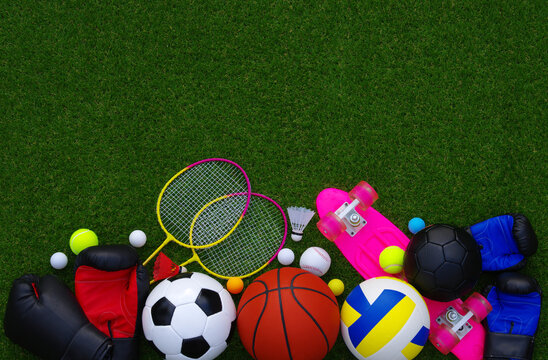 Sports equipment on green grass © Alekss