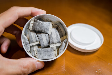 Snus - Snus, a moist powder tobacco product widely consumed in Norway and Sweden and among athletes	