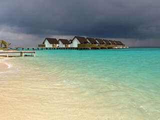 View of the on-water bungalows from the beach