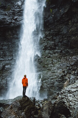 person with waterfall