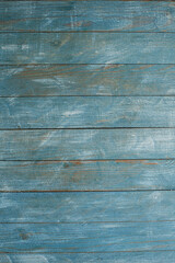 
Vintage blue wood background texture with knots and nail holes. Old painted wood wall. Blue abstract background. Vintage wooden dark blue horizontal boards. Front view with copy space. 