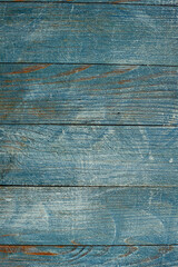Fototapeta premium Vintage blue wood background texture with knots and nail holes. Old painted wood wall. Blue abstract background. Vintage wooden dark blue horizontal boards. Front view with copy space. 