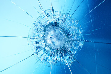 cracks on the glass impact on the glass, abstract background broken window damage