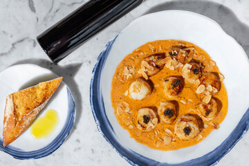 Grilled sea scallop with black caviar