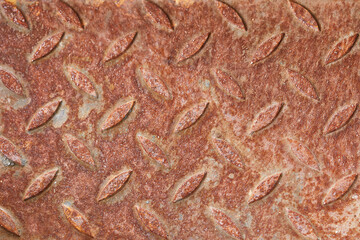 Top view of old non-slip flooring that has been used until rusting.