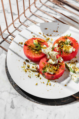 Watermelon with cheese and nuts