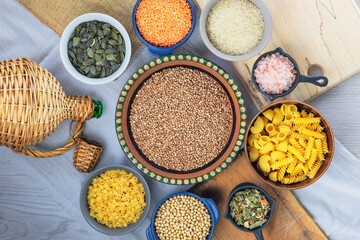 Various vegetarian organic products in bowls. Rural view. Top view.