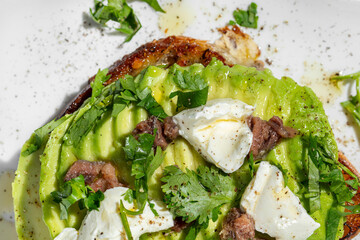 Bruschetta with avocado and anchovies