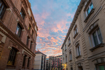 Skies at sunset with reddish clouds in the capital of Spain