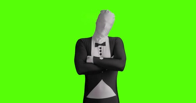 Static shot of a business morphsuit crossing his arms and obviously angry. Stubborn and arrogant