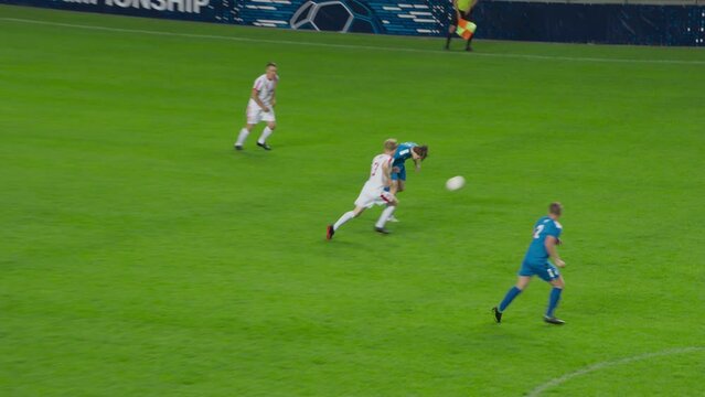 Soccer Football Championship Match: Blue Team Players with Forward Leading and Scoring Perfect Goal, Happy Players Celebrate Victory, Hug Striker. Sport Channel, Television Broadcast, Playback