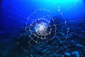 underwater accident broken porthole glass, cracks shipwreck