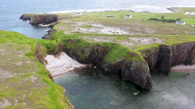 The cliffs and sea stacks at Port Challa and Port An Duin on Tory Island, County Donegal, Ireland