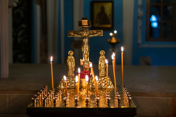 Burning candles in an Orthodox church - obrazy, fototapety, plakaty
