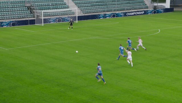 Soccer Football Match League Championship: Teams Play Dangerously, Attacks, Play Pass, Shooting and Missing Gates. Players on Tournament. Sport Channel Broadcast Television Playback. High Angle Wide