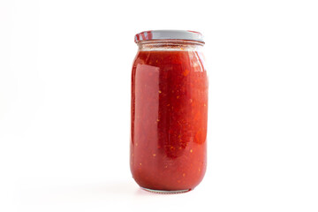 Fototapeta na wymiar tomato sauce in jar, isolated on white background