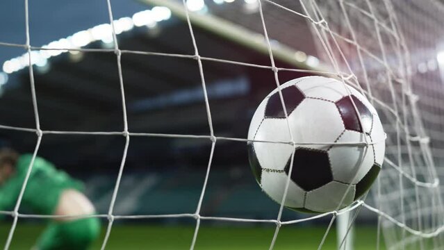 Football Championship: Ball Hits Net in Slow Motion. Goalkeeper Jumps and Fails to Protect Goals, Competition Scores Goal. Sport Channel Broadcast TV. Stylish Playback Repeat in Cinematic Slow Motion