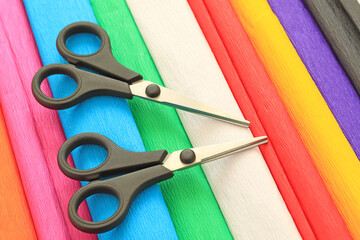 colorful crepe paper sheets and scissors