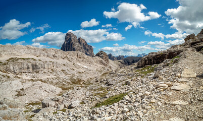 Panoramic hiking trail along the Tirol Sexten mountain chain during summer time