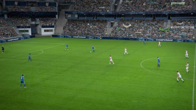 Soccer Football Championship Stadium with Crowd of Fans: Blue Team Attack and Score Goal, Players Celebrate Victory, Winners of Tournament. Sport Channel Broadcast Television Playback. High Angle Wide