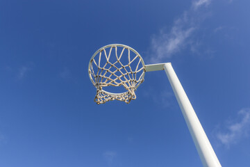 netball hoop against blue sky