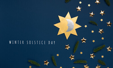 Winter solstice day holiday, December 21. Sun, moon and golden stars symbol on dark blue background.