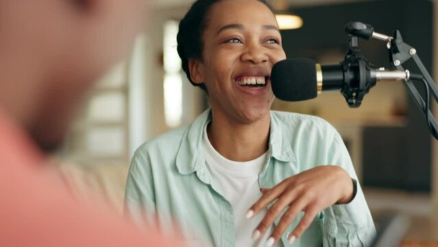 Black woman, radio microphone and podcast talking in social media interview with influencer, mentor and friend in house studio. Smile, happy and comic guest speaker in communication questions review