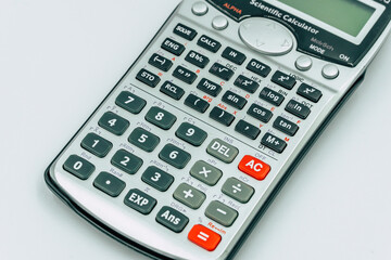 a scientific calculator on white background