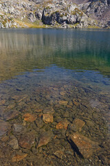 Fototapeta na wymiar Lake David shorelines in Belledonne mouantin range