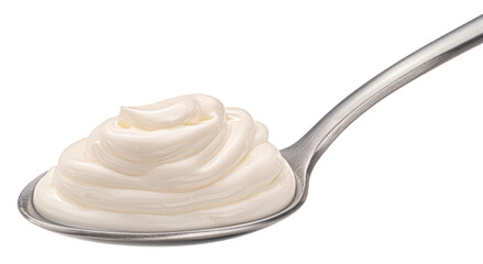 Sour cream in spoon isolated on white background
