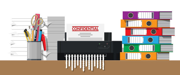 Obraz premium Hand putting contract paper in shredder machine