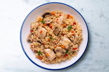 Rice paella with turkey and vegetables. Healthy recipe.